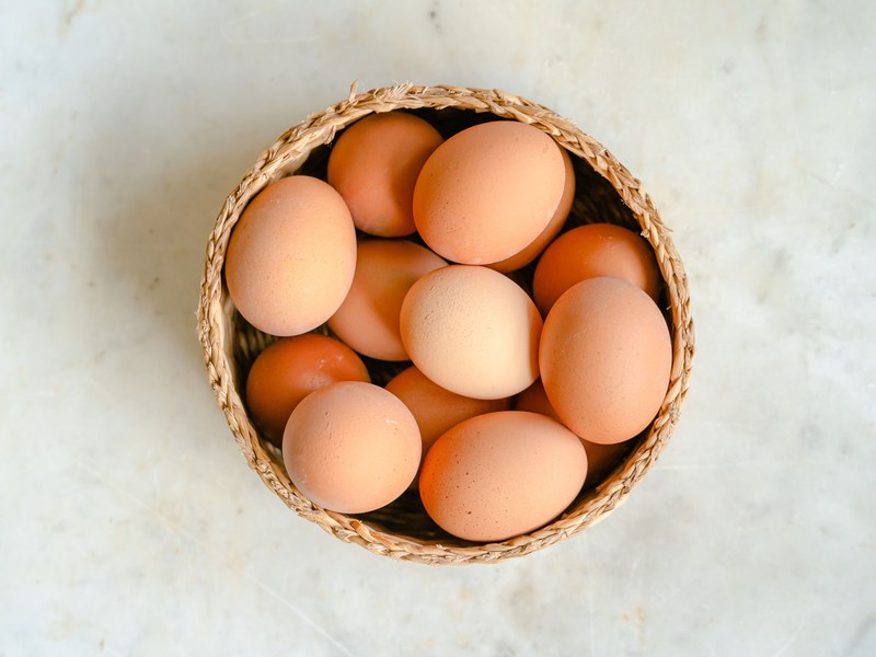 Brown eggs in a basket